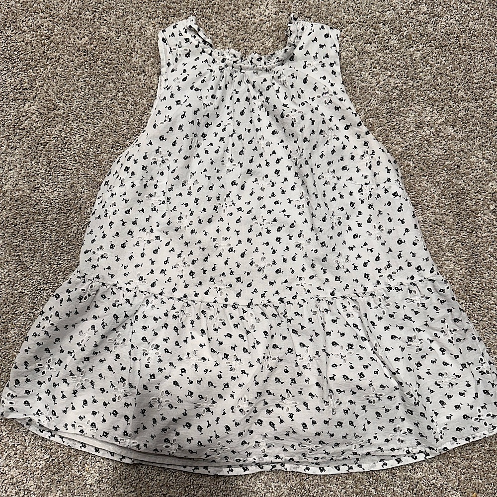 LOFT white sleeveless top with black floral print